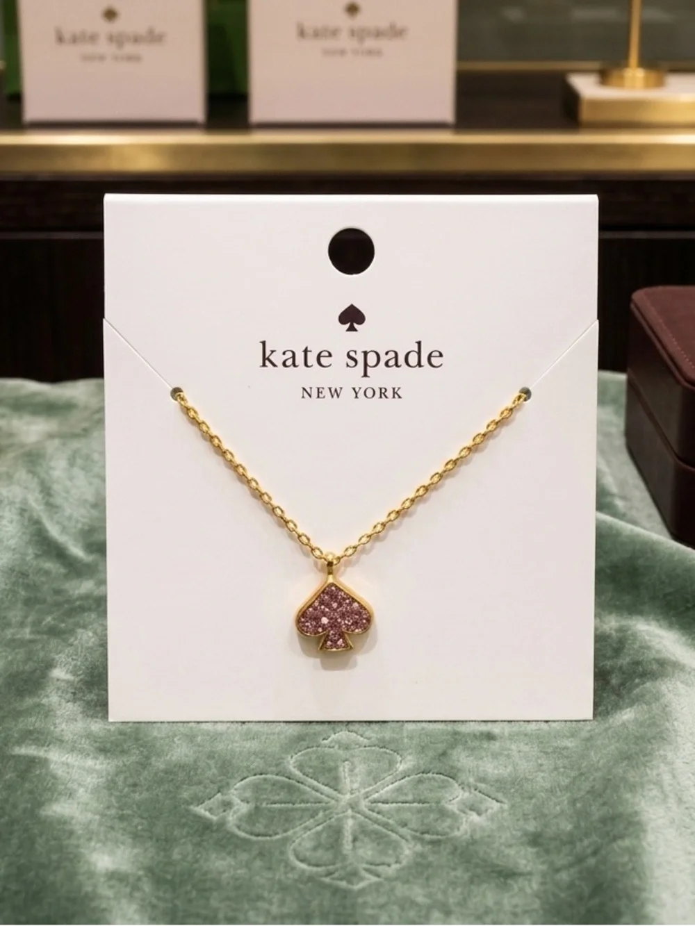kate spade Gold Tone Necklace with Pink Sparkle Spade Pendant